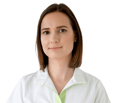 Žena v bielej uniforme, profesionálna.