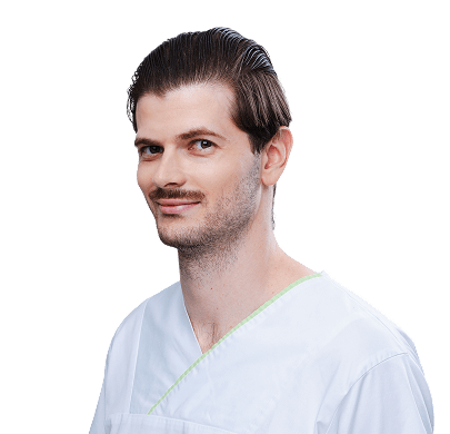 Dr. Tomáš Debnár 1 Muž v bielom lekárskom plášti.